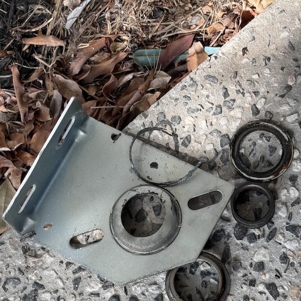 An actual shaft plate and bearing completely destroyed