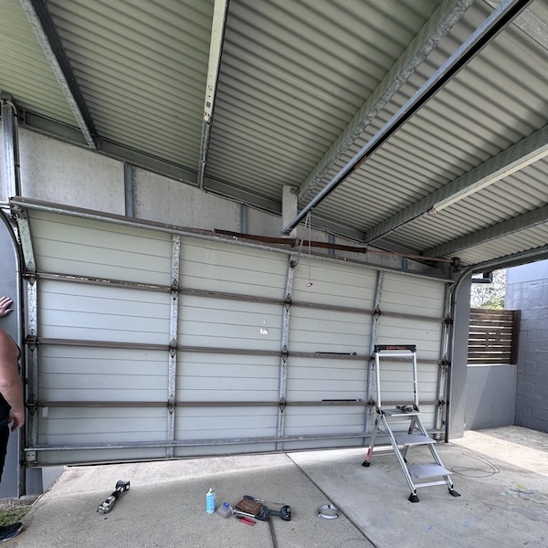 Installed new cables to straighten door